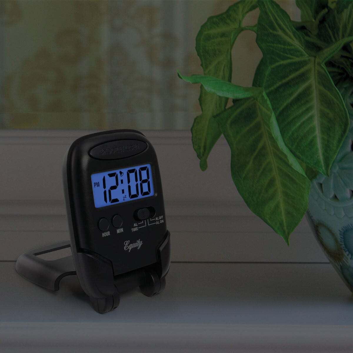 Equity 31302 LCD Travel Alarm Clock with Blue Backlight